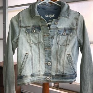 Jeans jacket cut at waist length